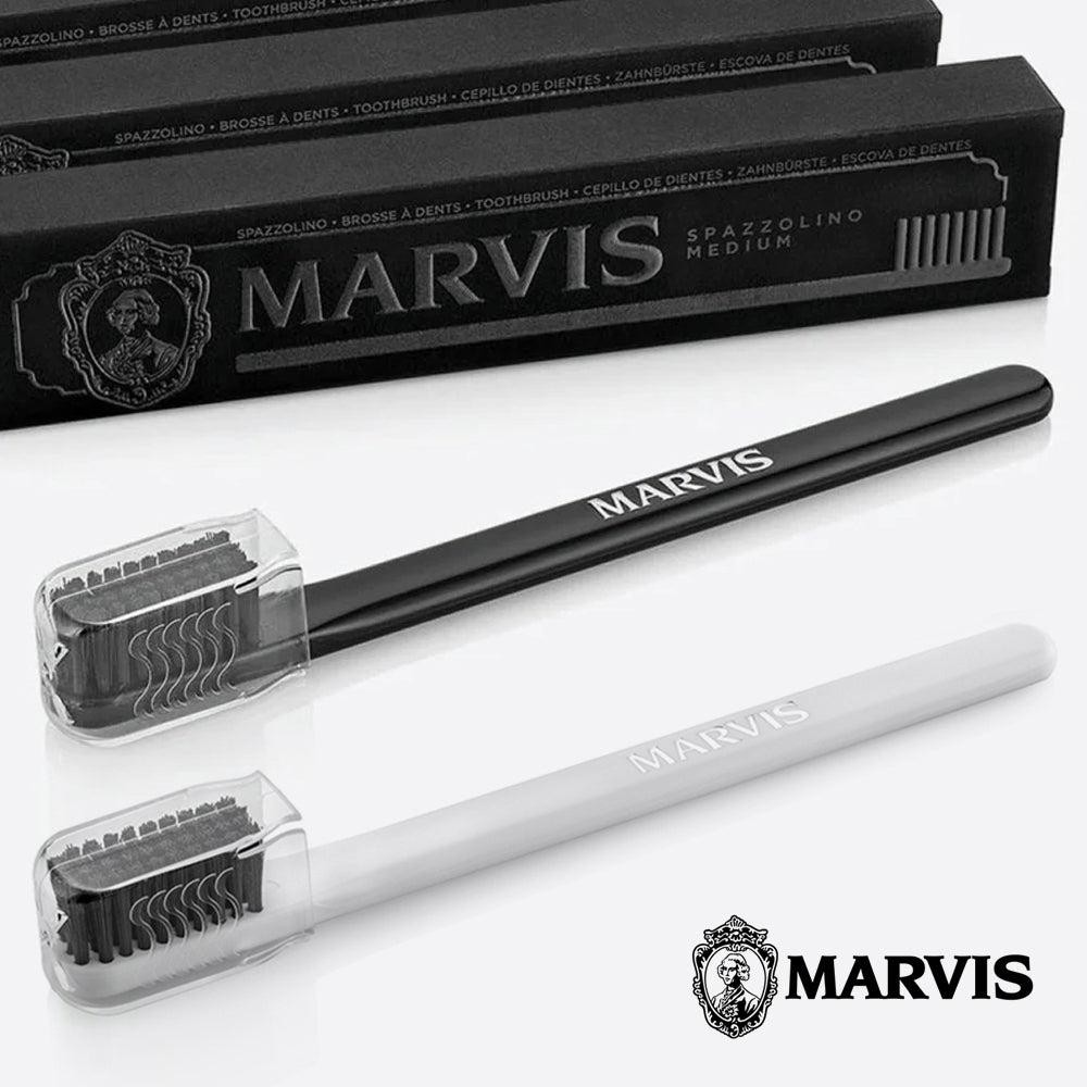 Marvis black toothbrush in retro-style packaging designed to complement Marvis toothpaste
