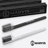 Marvis black toothbrush in retro-style packaging designed to complement Marvis toothpaste