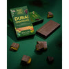 Nature's Factory Dubai Chocolate packaging with chocolate bars on a green surface