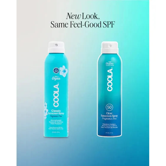 Two bottles of Coola sunscreen spray on a gradient background