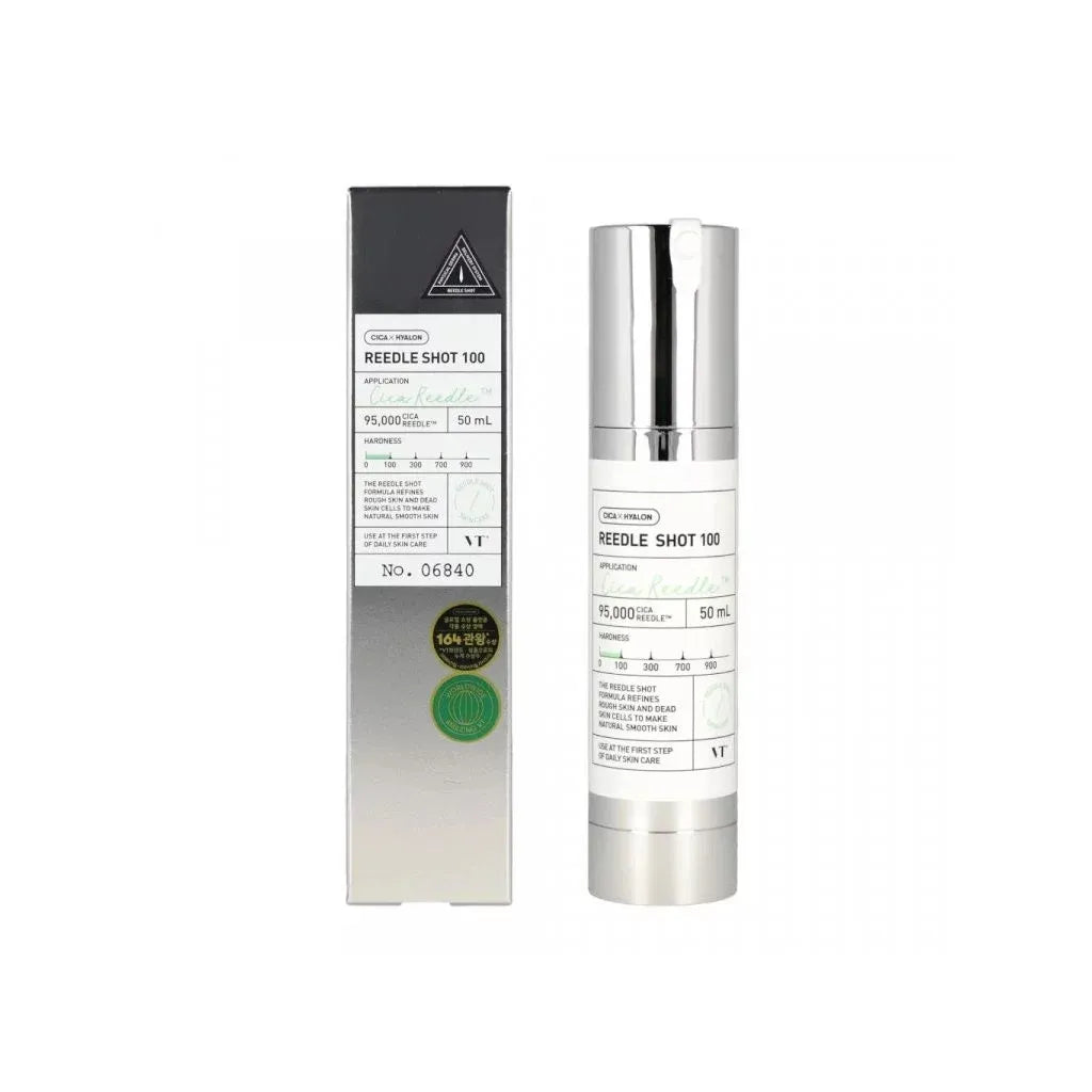 Skincare serum bottle with packaging on a white background