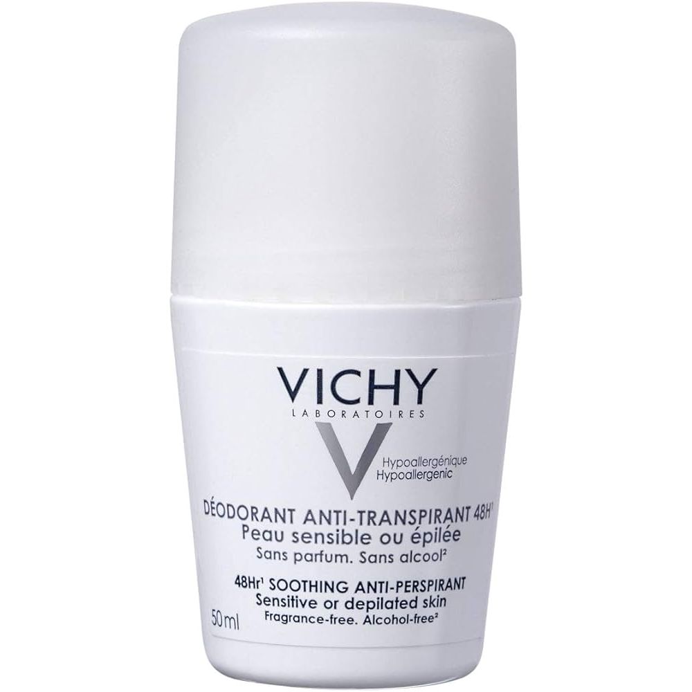 A white roll-on deodorant bottle with blue and green label, Vichy brand.