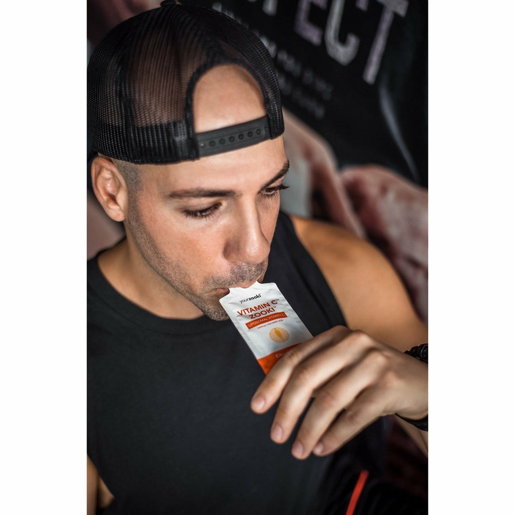 Men drinking YourZooki Vitamin C