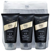 A travel set of DSD de Luxe hair care products including shampoo, hair mask, and hair serum, packaged in black tubes with gold and white accents, displayed in front of a gray background.