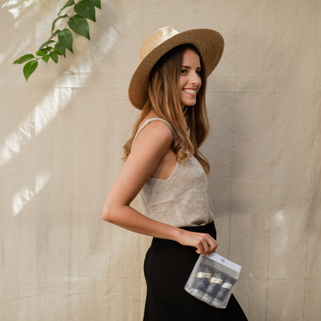 DSD TRAVEL KIT AND WOMAN SMILING