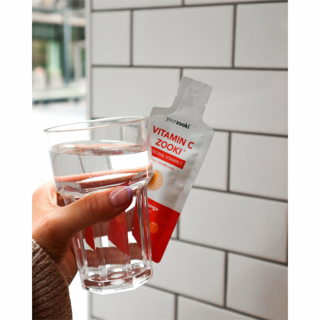 YourZooki Vitamin C with glass of water