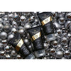 A travel set of DSD de Luxe hair care products including shampoo, hair mask, and hair serum, packaged in black tubes with gold and white accents