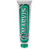 A tube of Marvis Classic Strong Mint toothpaste with a green label and white branding text.